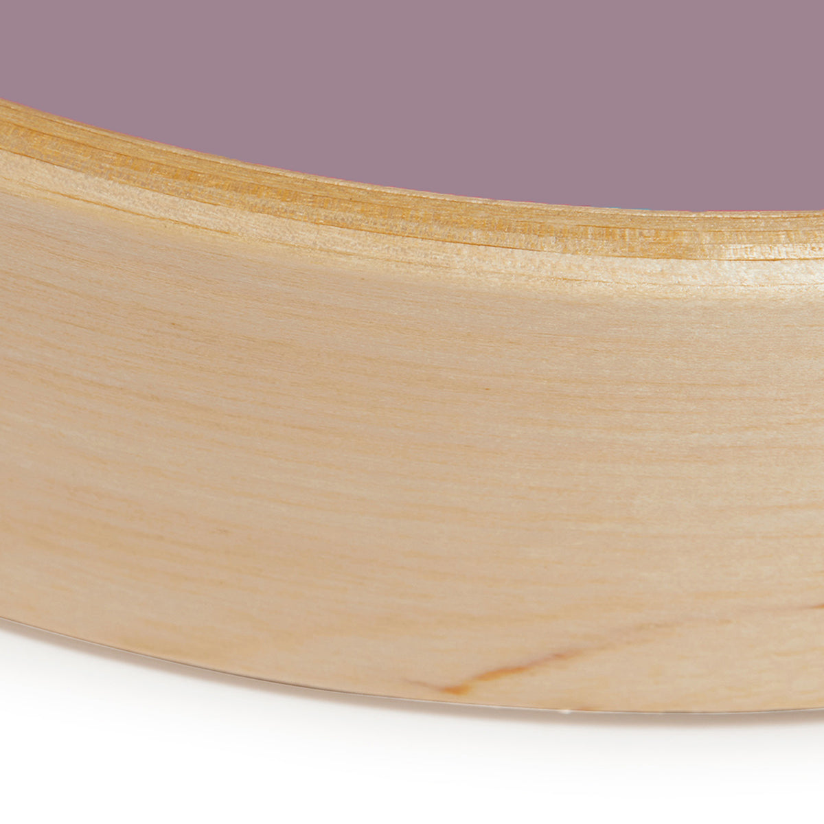 Close up detail of natural bamboo wall clock frame