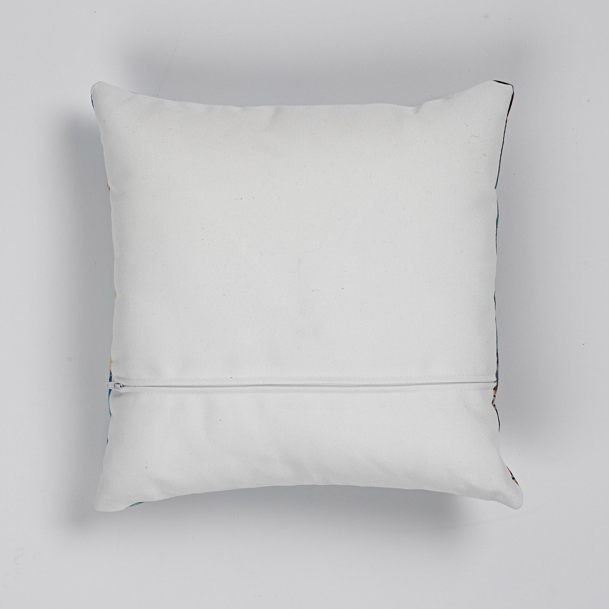 Reverse of faux linen cushion, which is ivory, with zipper for cover removal.